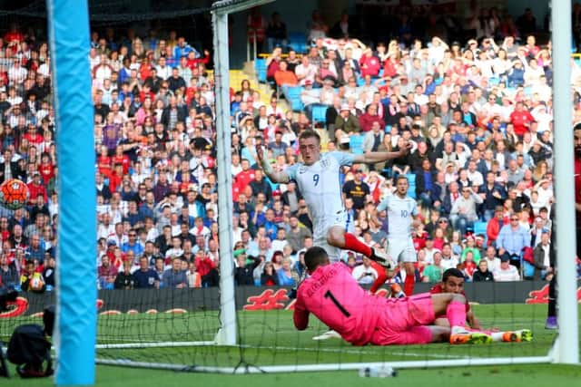 Jamie Vardy forces the ball past goalkeeper Volkan Babacan to score Englands late winner. Picture: Getty