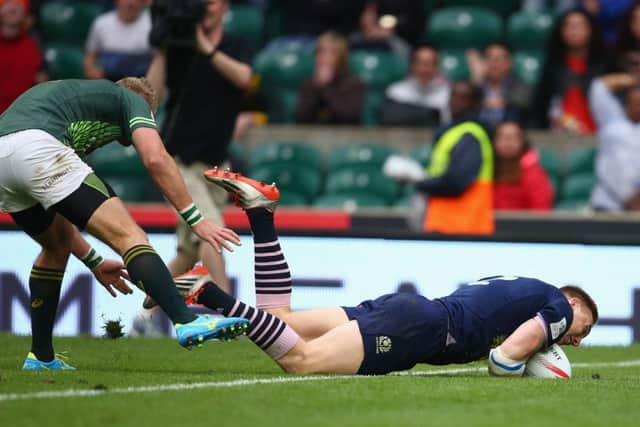 Dougie Fife of Scotland scores the winning try during the Final. Picture: Getty