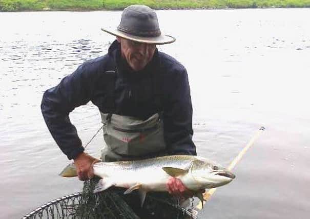 Jim  Cairns with the unlucky fish. Picture: Deadline News