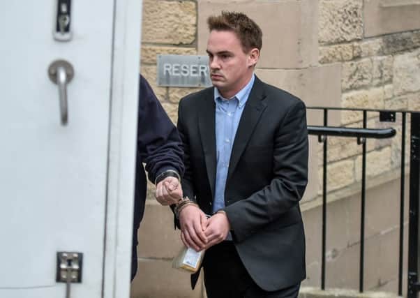Jonathan Wylie, a former PE Teacher, is led to a prison van after being jailed last year at Elgin Sheriff Court. Picture: Hemedia