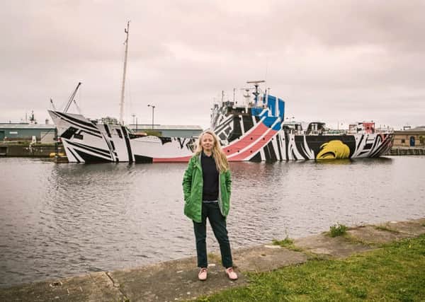 Ciara Phillips in front of her "Dazzle Ship". Picture: TSPL