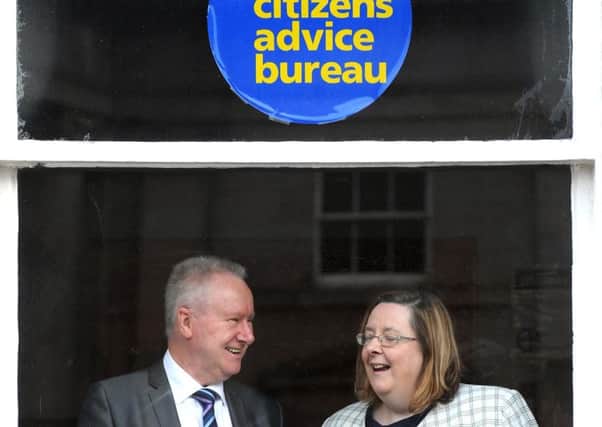 Alex Neil MSP with Margaret Lynch, since sacked as chief executive. Picture: Lisa Ferguson