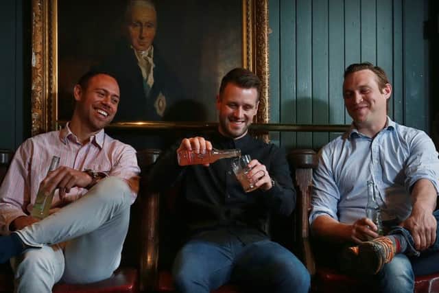From left: Dave Millard, David McLauchlan and James Doig launch their whisky cocktail. Picture: Stewart Attwood