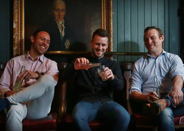 From left: Dave Millard, David McLauchlan and James Doig launch their whisky cocktail. Picture: Stewart Attwood