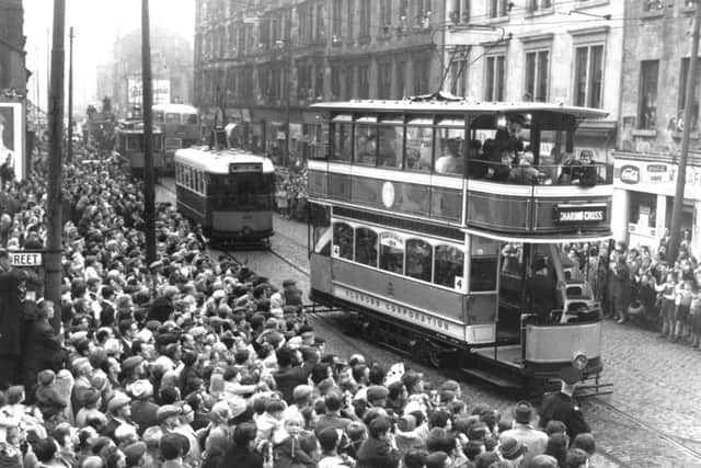 Crowds gather to watch the last day of service for Glasgow's tram network on September 9, 1962. A bid to open a new light-rail system was defeated in 1996. Picture: TSPL