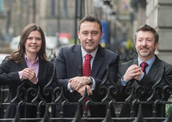 Wealth manager Steven Sweeney (centre). Picture: Phil Wilkinson
