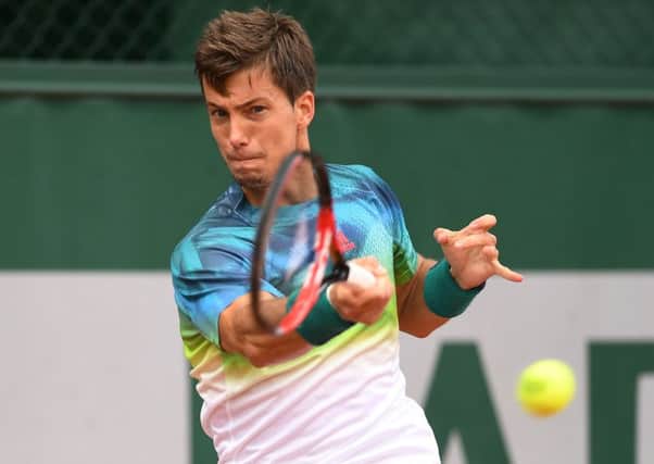 Aljaz Bedene of Great Britain plays a forehand during his first-round match against Gerald Melzer of Austria at the French Open at Roland Garros. Picture: Dennis Grombkowski/Getty