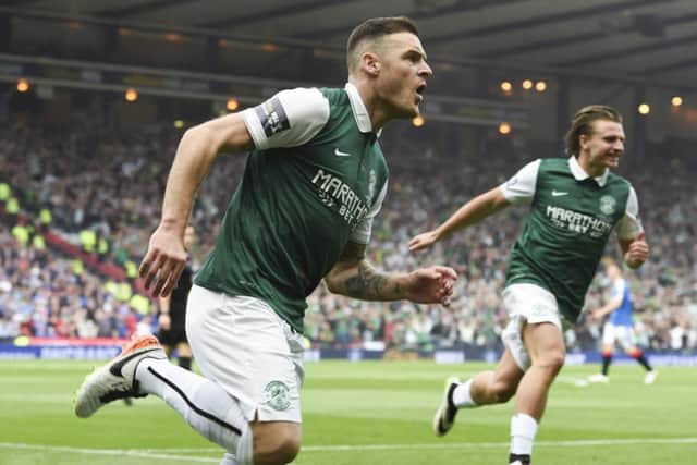 Anthony Stokes signed off his loan spell at Hibs by grabbing two goals in the Scottish Cup final win over Rangers. Picture: SNS Group