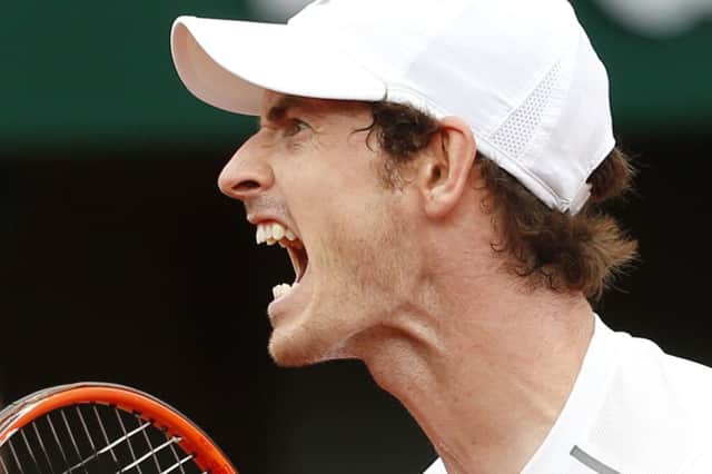 Andy Murray screams during his hard-fought second round win over Frances Mathias Bourgu. Picture: Alastair Grant/AP