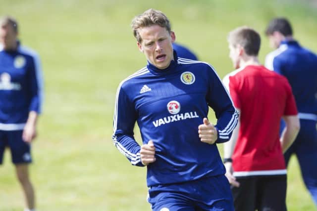 Christophe Berra hard at work during Scotland training. Picture: SNS