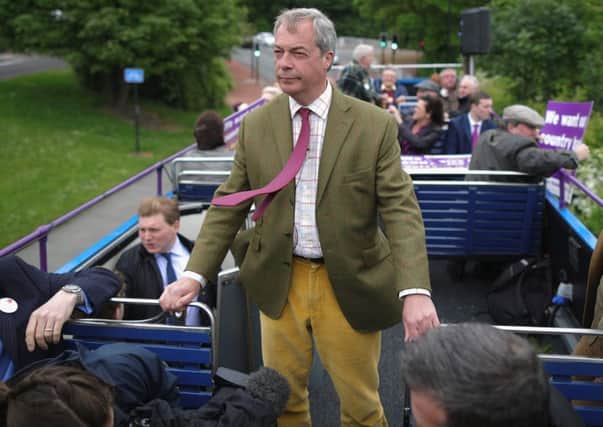 Nigel Farage travels on his battle bus as he campaigns for votes to leave the European Union. Picture: Christopher Furlong/Getty Images