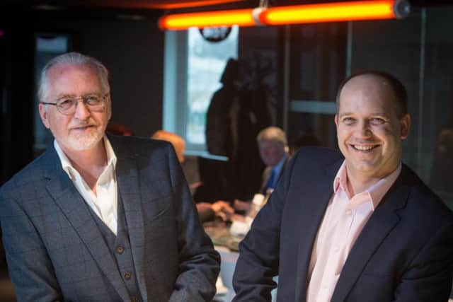 Elevator's Graham Morgan, left, with KPMG partner Moray Barber. Picture: Michal Wachucik