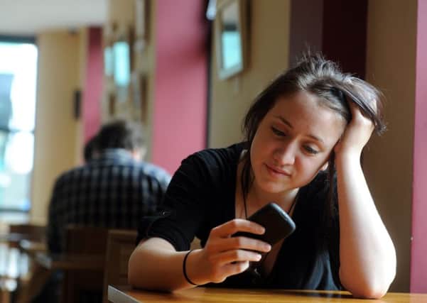 People using their smartphone for work tasks are increasing cyber security risks for business, it has been claimed PIC Dan Phillips