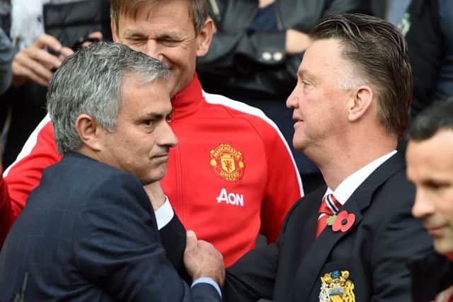 Jose Mourinho, left, is expected to be confirmed as the managerial successor to Louis van Gaal, right, at Manchester United on Friday. Picture: Martin Rickett/PA.