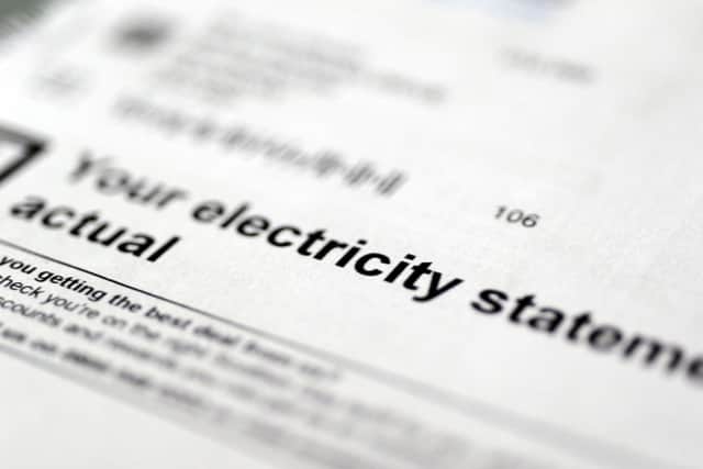 John Devlin 03/12/14. GLASGOW. Electric , electricity , utility , bill , scottish gas . Scottish Gas , debt , direct debit , stock , statement. energy . debit. debt.ELECTRIC. Electricity.