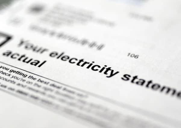 John Devlin 03/12/14. GLASGOW. Electric , electricity , utility , bill , scottish gas . Scottish Gas , debt , direct debit , stock , statement. energy . debit. debt.ELECTRIC. Electricity.