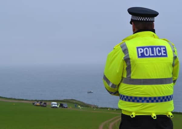 A police officer at the scene at Kinneff. Picture: Alison Campsie