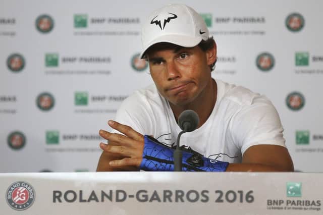 Rafael Nadal announces he is pulling out of the French Open because of an injury to his left wrist. Picture: Michel Euler/AP