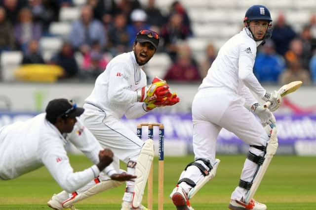 Alex Hales is caught at slip by Angelo Matthews as wickekeeper Dinesh Chandimal looks on. Picture: Getty