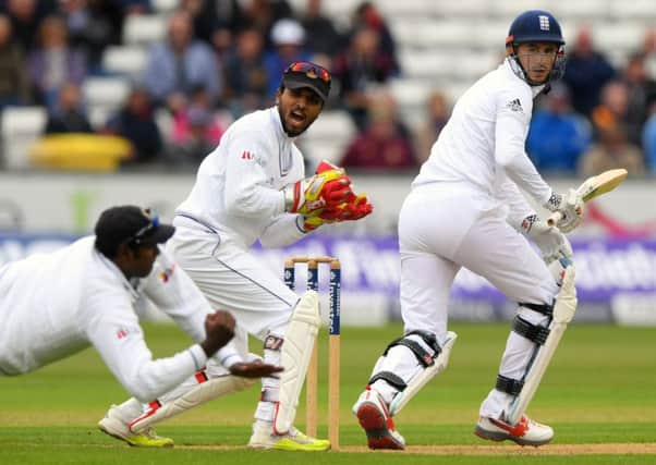 Alex Hales is caught at slip by Angelo Matthews as wickekeeper Dinesh Chandimal looks on. Picture: Getty