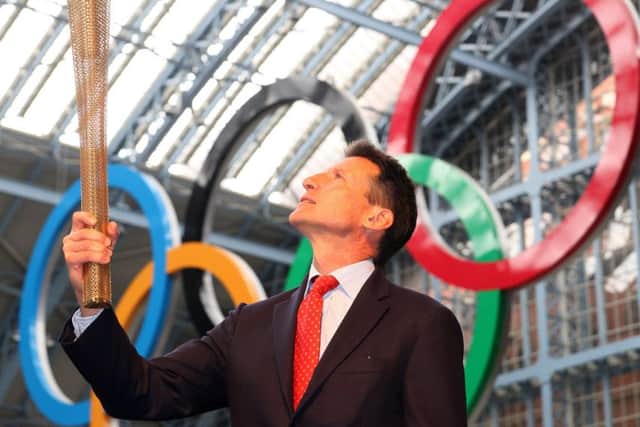 Lord Coe with the 2012 London Olympic Torch. Picture: AFP/Getty