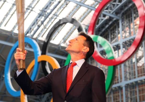 Lord Coe with the 2012 London Olympic Torch. Picture: AFP/Getty