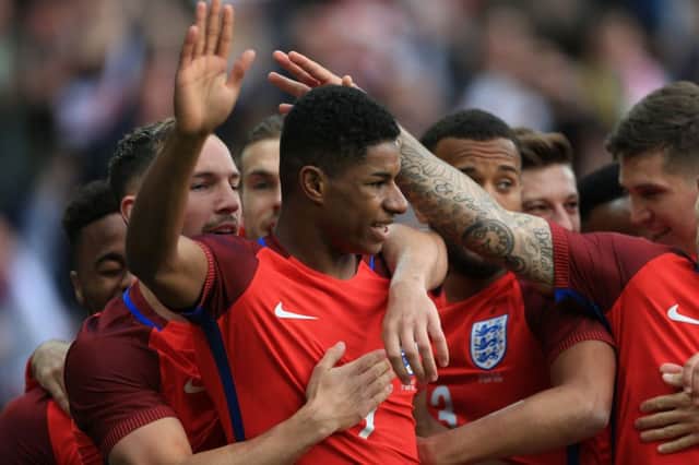 Marcus Rashford celebrates scoring England's opening goal. Picture: Tim Goode/PA Wire