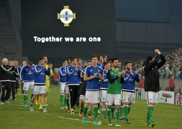 Northern Ireland players acknowledge the crowd following the win over Belarus on Friday. Picture: Charles McQuillan/Getty Images