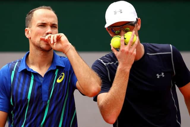 Jamie Murray, right, with doubles partner Bruno Soares of Brazil.  Picture: Clive Brunskill/Getty Images