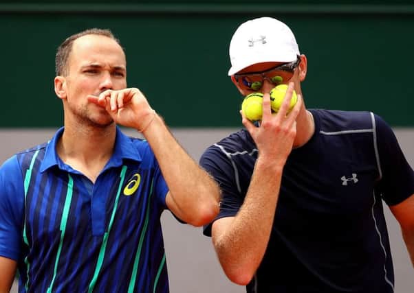 Jamie Murray, right, with doubles partner Bruno Soares of Brazil. Picture: Clive Brunskill/Getty Images