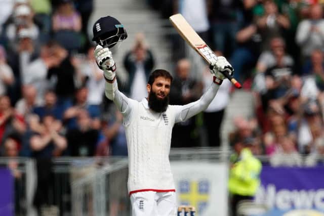 Moeen Ali celebrates his century at Chester-le-Street. He went to make an unbeaten 155. Picture: Owen Humphreys/PA