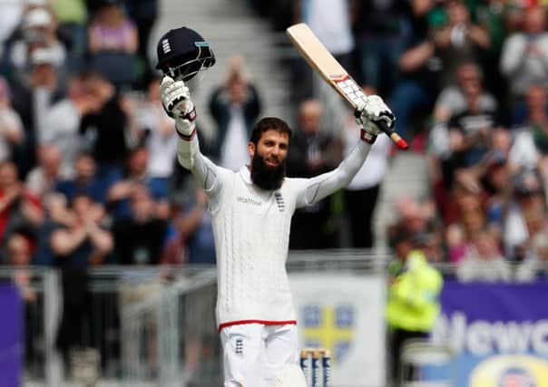 Moeen Ali celebrates his century at Chester-le-Street. He went to make an unbeaten 155. Picture: Owen Humphreys/PA