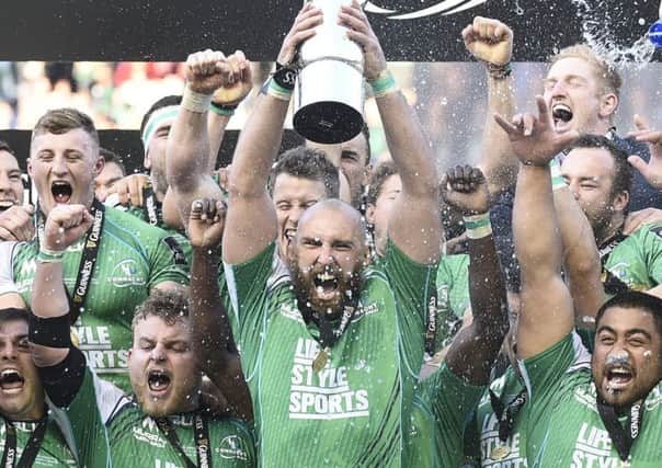 Connacht skipper John Muldoon lifts the Pro12 trophy as his team-mates celebrate their win. Picture: Jane Barlow/PA Wire