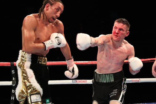 Willie Limond throws a right at Tyrone Nurse, but it was to no avail, the fight was stopped in the ninth. Picture: Steve Welsh