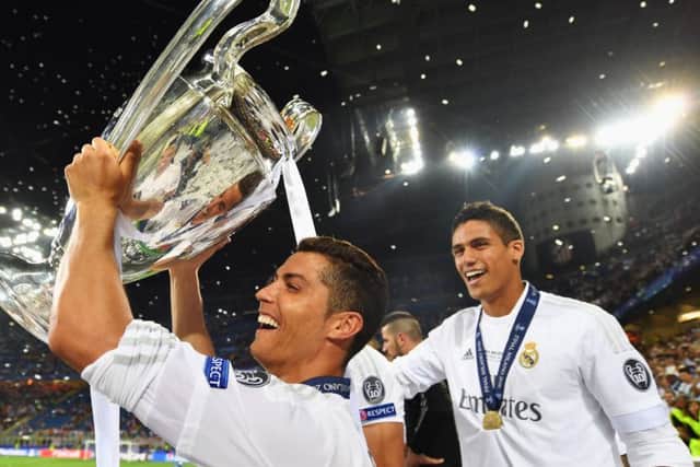 Cristiano Ronaldo celebrates with the trophy following the penalty shoot-out decider in Milan. Picture: Getty Images