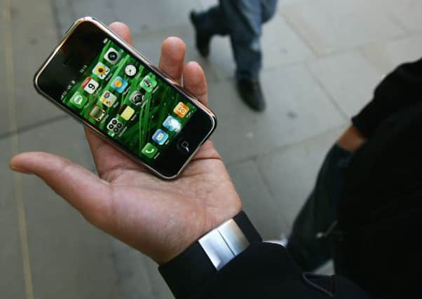 A report has suggested that smartphones could be used to modernise the criminal justice process in Scotland. Picture: Getty Images