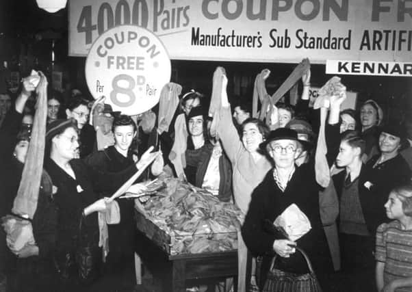 Some of the women who rushed to a Croydon store to take advantage of a coupon-free sub-standard stockings offer. Picture: Keystone/Getty Images