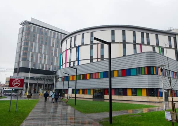 The man was freed from the car and airlifted to the Queen Elizabeth University Hospital in Glasgow where he later died. Picture: TSPL