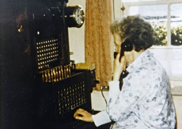 Effie Macdougall on the manual telephone exchange at Craighouse on the Isle of Jura, 1974