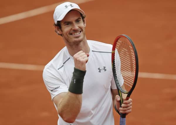 Andy Murray celebrates winning his quarter final match against France's Richard Gasquet. Picture: AP