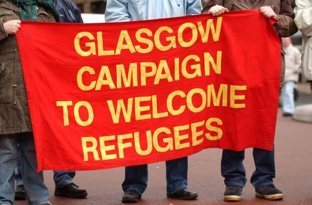 A banner welcomes asylum seekers to Glasgow. Picture: Robert Perry