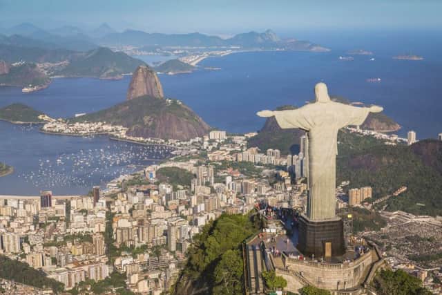 An aerial view of Christ the Redeemer and Botafogo Bay