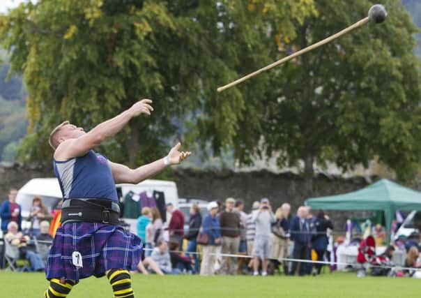 Hammer thrower Neil Elliot wins at the Peebles Highland Games last year.