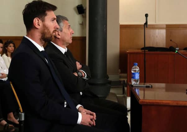 Barcelona's football star Lionel Messi facing judges in a tax fraud case at a courthouse in Barcelona.
Picture: AFP/Getty Images