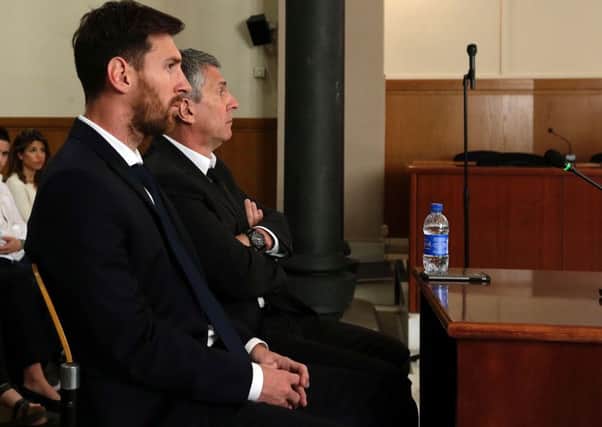 Barcelona's football star Lionel Messi facing judges in a tax fraud case at a courthouse in Barcelona.
 Picture: AFP/Getty Images