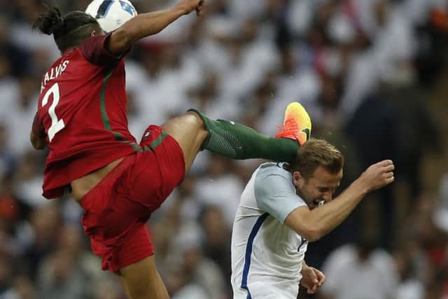 Portugal defender Bruno Alves was sent off for a head-high challenge on England striker Harry Kane. Picture: Adrian Dennis/AFP/Getty Images