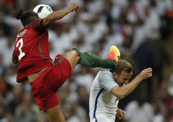 Portugal defender Bruno Alves was sent off for a head-high challenge on England striker Harry Kane. Picture: Adrian Dennis/AFP/Getty Images