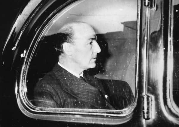Seen through a car window, Conservative MP and War Minister, John Profumo whose relationship with Christine Keeler caused a national scandal and forced him to resign.  Picture: Central Press/Getty Images