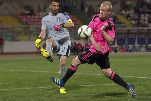 Scotland'sÂ Steven Naismith and Italy's Gianluigi Buffon during the teams' friendly in Malta. Picture: Craig Williamson/SNS