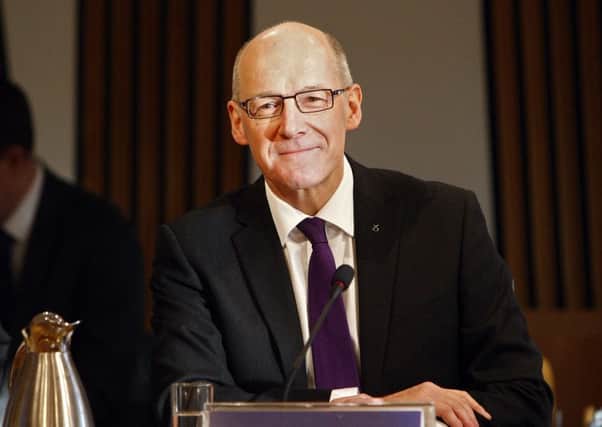 John Swinney has hit out at critics of the Named Persons scheme. Picture: Andrew Cowan/Scottish Parliament